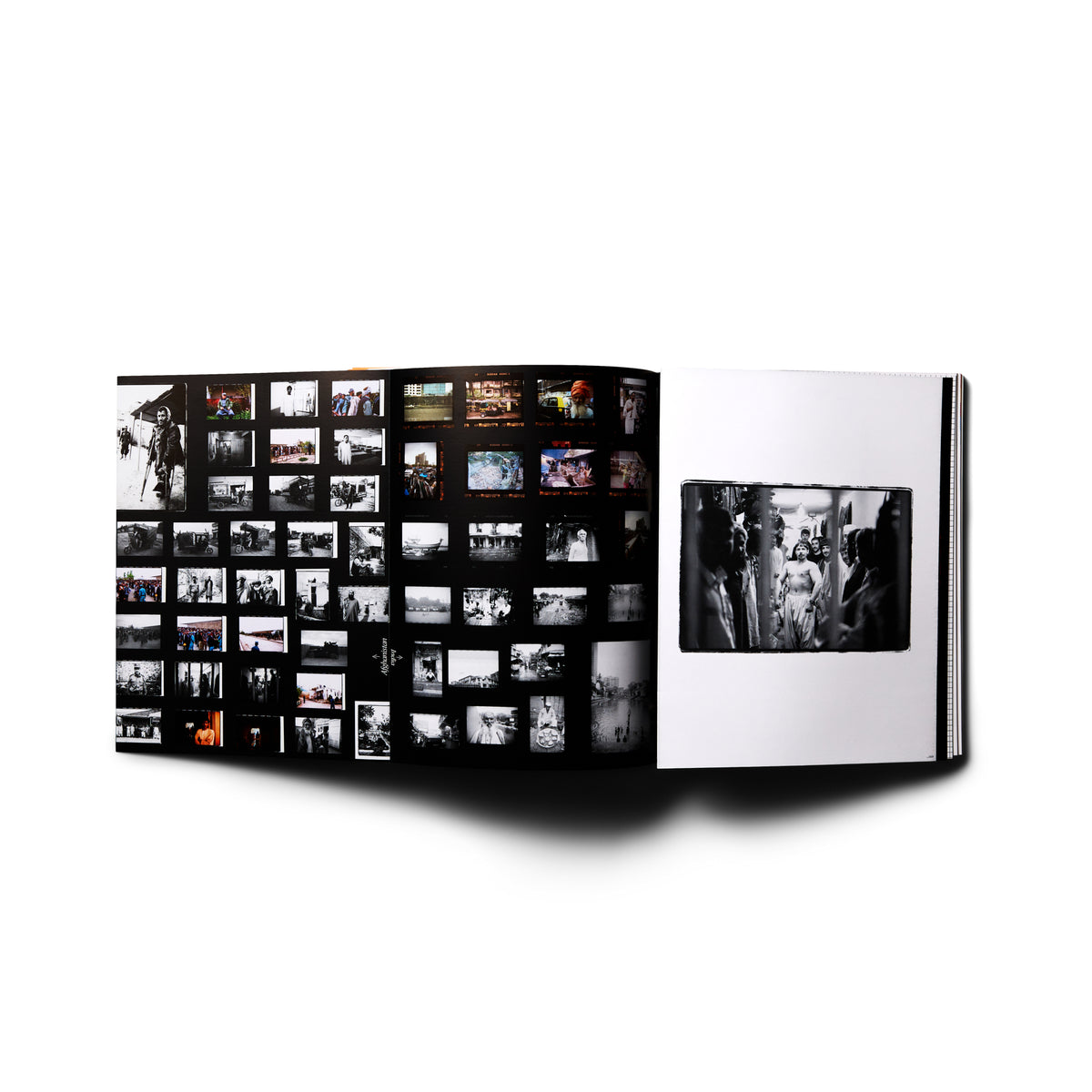 Open spread with a contact-sheet grid of black-and-white photos beside a single large black-and-white photo